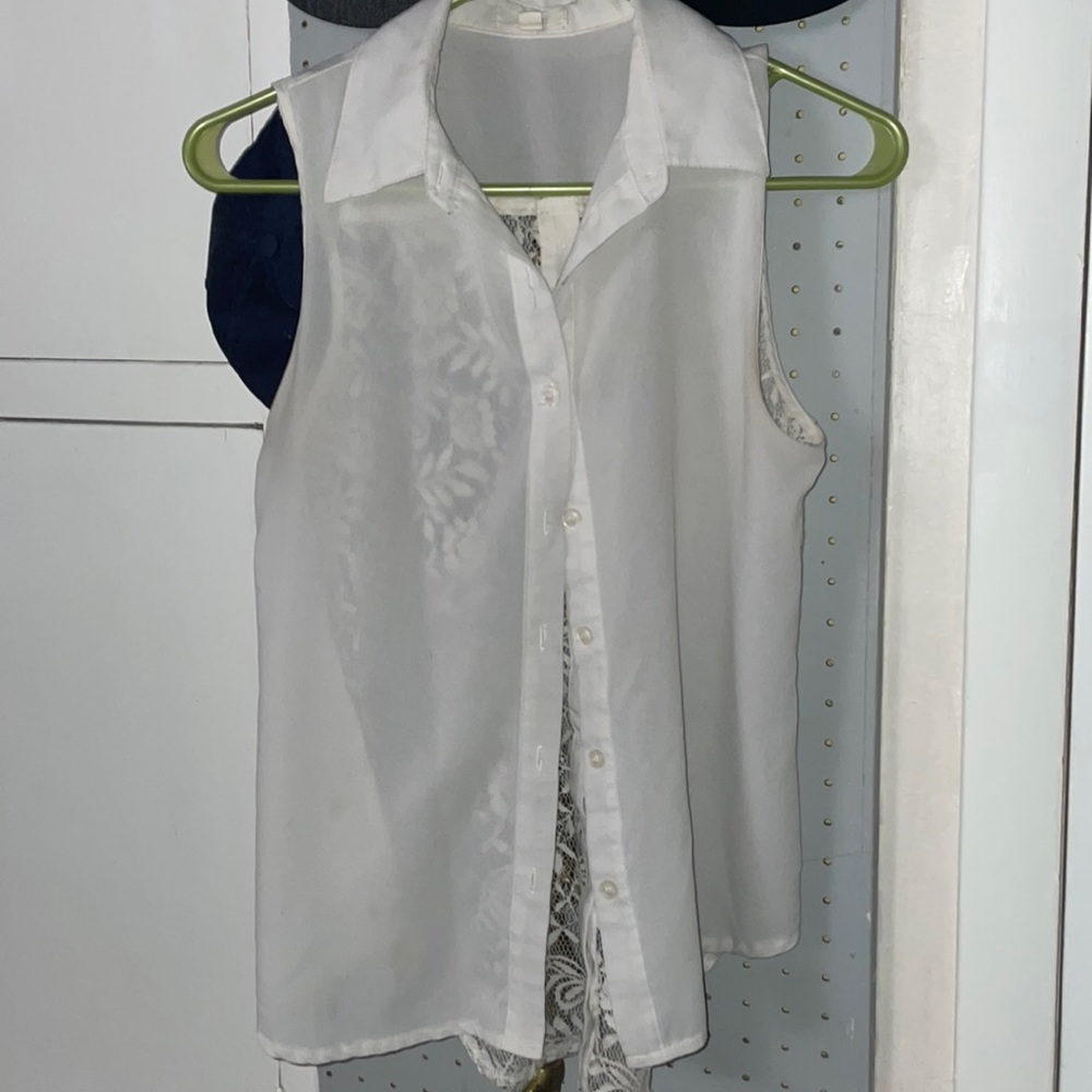 From “Mine” collection. White button up lace back sleeveless top
